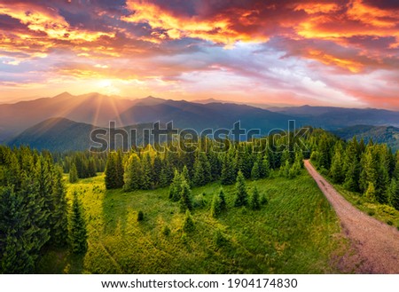 Amazing summer view from flying drone of Yahidna mountain in the first sunlight. Attractive sunrise in Carpathian mountains, Ukraine, Europe. Beauty of nature concept background.
