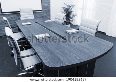 conference table with the screen in the office