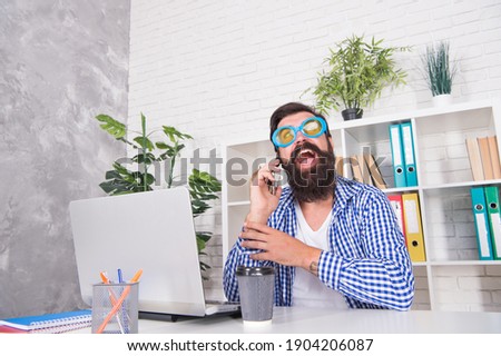 Thanks for calling. Bearded man talk on phone in office. Talk time. Business communication. Modern lifestyle. Mobile technology. 3G. 4G.