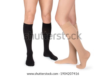 Compression Hosiery. Medical Compression stockings and tights for varicose veins and venouse therapy. Socks for man and women. Clinical compression knits. Comfort maternity tights for pregnant women. Royalty-Free Stock Photo #1904207416