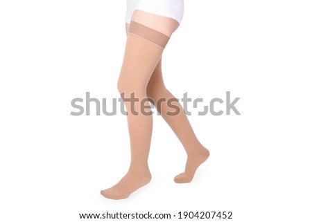 Compression Hosiery. Medical Compression stockings and tights for varicose veins and venouse therapy. Socks for man and women. Clinical compression knits. Comfort maternity tights for pregnant women. Royalty-Free Stock Photo #1904207452