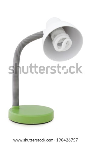 Green desk lamp on white background.