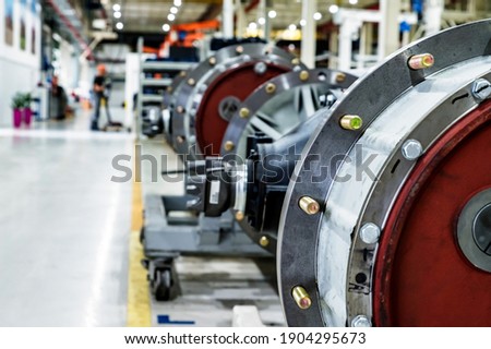 Disassembled tractor reduction axle on modern tractor Royalty-Free Stock Photo #1904295673