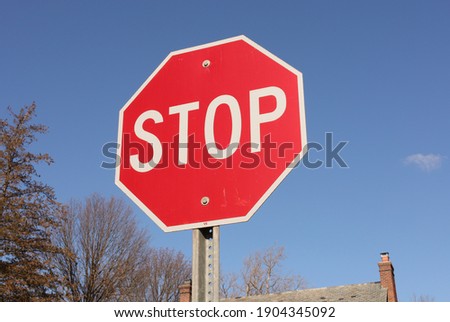 Stop sign in suburb neighborhood
