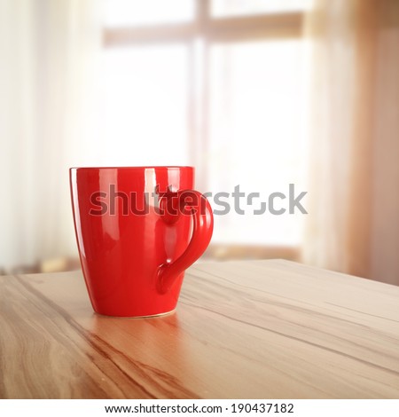 window coffee mug and morning time 