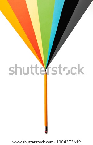 
multicolored rainbow triangle and a simple pencil on a white background. concept of creativity. copy space