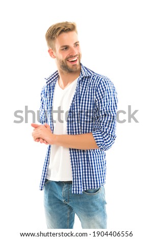 Young and carefree. unshaven guy has groomed hair isolated on white background. hairdresser service concept. skin and hair care. handsome young man wear checkered shirt. casual male fashion style.