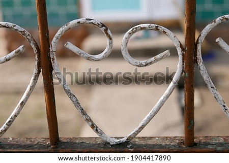 Hearts drawn on the gates of the USSR. Heart painted on the gate. Iron heart. Stylish heart that was used on gates and fences in the USSR. Hearts of St. Valentine