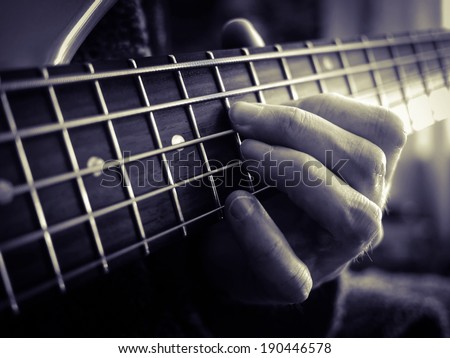 Playing a rock guitar
