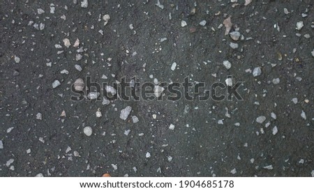 Wet grey gravel texture photo
