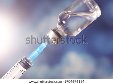 COVID-19. Vaccine, test and syringe for injection. Immunization and treatment for corona virus infection. Pandemic SARS-Cov-2 2020 Royalty-Free Stock Photo #1904696134