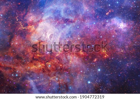Awesome galaxy somewhere in outer space. Cosmic wallpaper. Elements of this image furnished by NASA Royalty-Free Stock Photo #1904772319