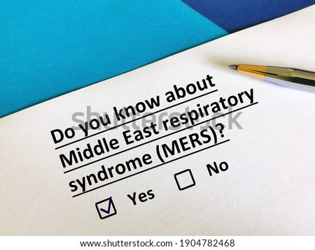 One person is answering question about pandemic.  He knows about Middle East Respiratory Syndrome (MERS). Royalty-Free Stock Photo #1904782468