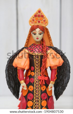 Plasticine modelling clay. Figure of russian woman. Developing activities, creative idea, hobby, art. Plasticine art sculpture. Sculpts from plasticine modelling clay. Black Swan, plasticine Firebird