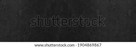 Panorama of Dark grey black slate background or texture. Black granite slabs background Royalty-Free Stock Photo #1904869867