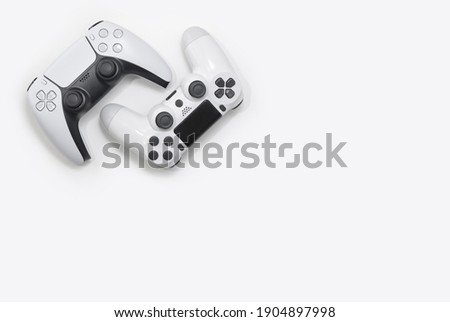 Next vs Old generation game controllers Royalty-Free Stock Photo #1904897998