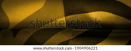 Texture. Template. Picture. silk fabric of abstract shades of yellow. silk texture, luxurious satin for abstraction, design and wallpaper,