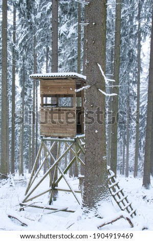 A hunters house in a snowy forest on the Glaskopf, Taunus, Hessen with snow 