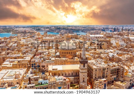 Aerial view early morning at sunrise of Lady of Mount Carmel church, St.Paul's Cathedral in Valletta city center, Malta