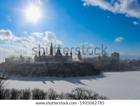 Parliament of Canada in winter. Cityscape of Ottawa, the capital of Canada. Canadian travel destination in snow landscape.
