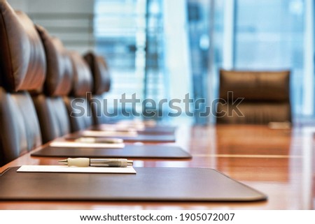 Closeup of an empty conference room before meeting Royalty-Free Stock Photo #1905072007
