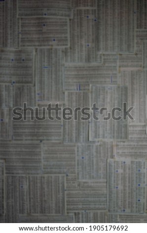 Blurred background about covid media. Newspaper background unfocused for wallpaper. News in a wall, moody abstract background. 