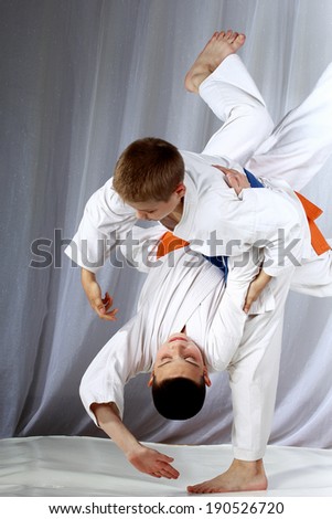 High throw techniques nage-waza are training athletes in judogi Royalty-Free Stock Photo #190526720