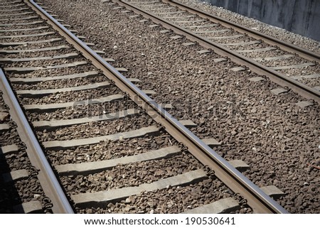 Closeup of railroad tracks on gravel