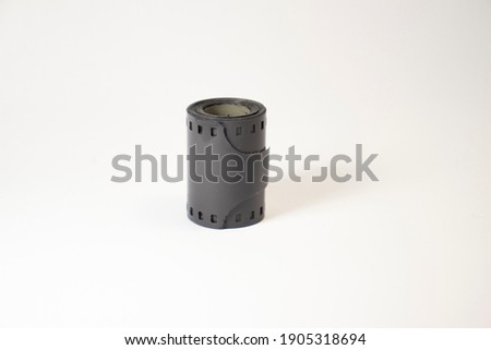 old photographic film on white isolated background with copy space