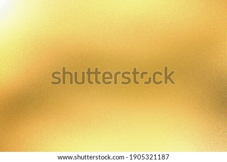 Light shining on yellow foil glitter metallic wall with copy space, abstract texture background Royalty-Free Stock Photo #1905321187