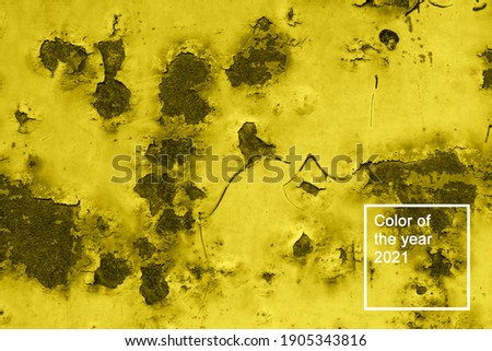Corroded metal background. Rusted painted metal wall corrosion with streaks of rust. Color of the year 2021