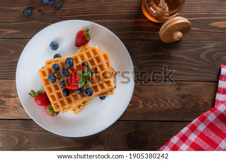 Hot waffle with fresh fruits 