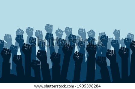 Group of fists raised in air. Group of protestors fists raised up in the air vector illustration  Royalty-Free Stock Photo #1905398284