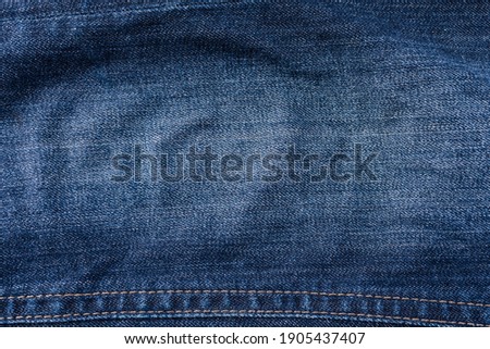 vintage jeans fashion background,close up of blue denim as the fashion texture.