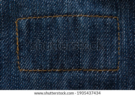 vintage jeans fashion background,close up of blue denim as the fashion texture.