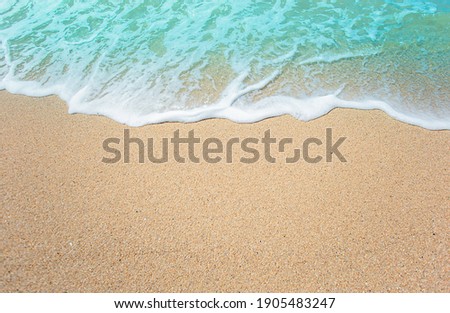 Soft blue ocean wave on the beach and soft wave background.
