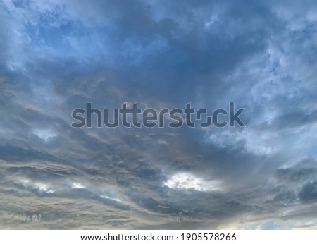 Stratocumulus Cloud Background Roll the clouds up in the sky Beautiful and unusual In the evening in Trang Province, Thailand.