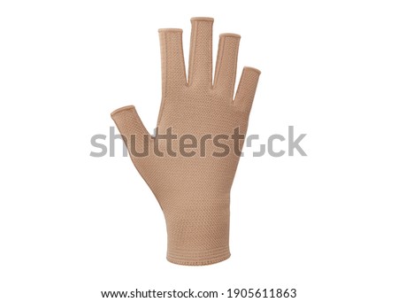 Сompression gloves with open fingers. Compression pressure on the hand against edema. Prevention after wrist and arm surgery. Medical gloves isolated on white background. Compression hosiery