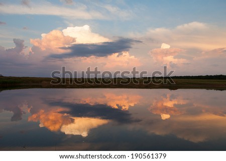 Sky and clouds reflection on Lake