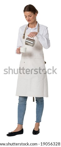 Female barista standing and making cappuccino, isolated on white background Royalty-Free Stock Photo #1905632818