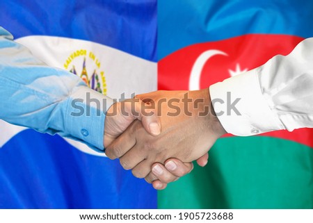 Business handshake on the background of two flags. Men handshake on the background of the El Salvador and Azerbaijan flag. Support concept