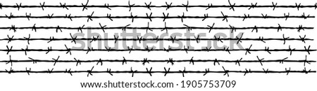 Several rows of sharp rusty barbed wire isolated on white background Royalty-Free Stock Photo #1905753709