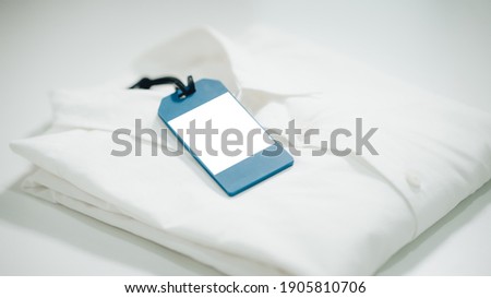 White classic men shirt with label isolated 