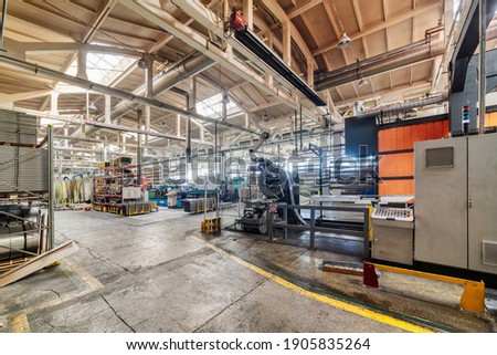 The interior of the metalworking shop. The interior of the metalworking shop. Modern industrial enterprise. Royalty-Free Stock Photo #1905835264