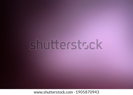 Abstract festive defocused background. Gradient purple spot on dark background