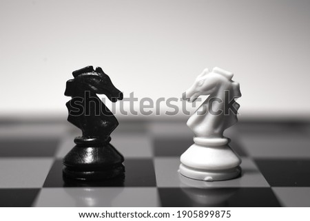 Knight on of the chess game in black and white color
