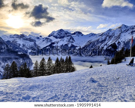 Oeschinen Lake is an Alpine lake in the Bernese Oberland, Switzerland,  east of Kandersteg in the Oeschinen valley. Royalty-Free Stock Photo #1905991414