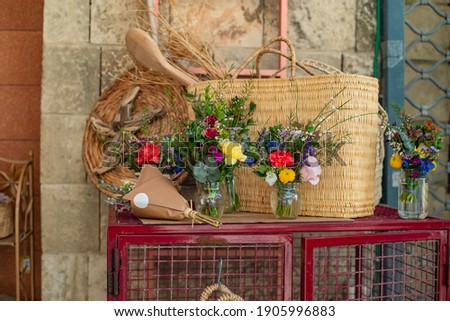 interior details made of flowers and straw, street shop of cozy items
