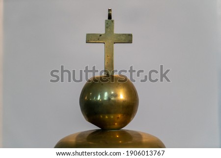 Sacred and holy golden cross symbol in church
