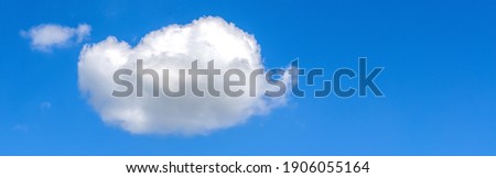 Banner of white cloud on blue sky. Horizontal photo banner for website header design